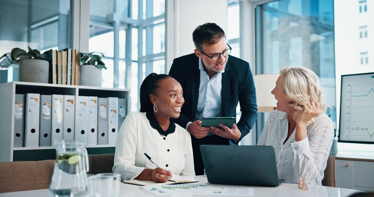 Accounting, office and business people with meeting, feedback and manager for laptop, discussion and graphs. Training, teamwork and talk with tablet, growth strategy or project report for finance