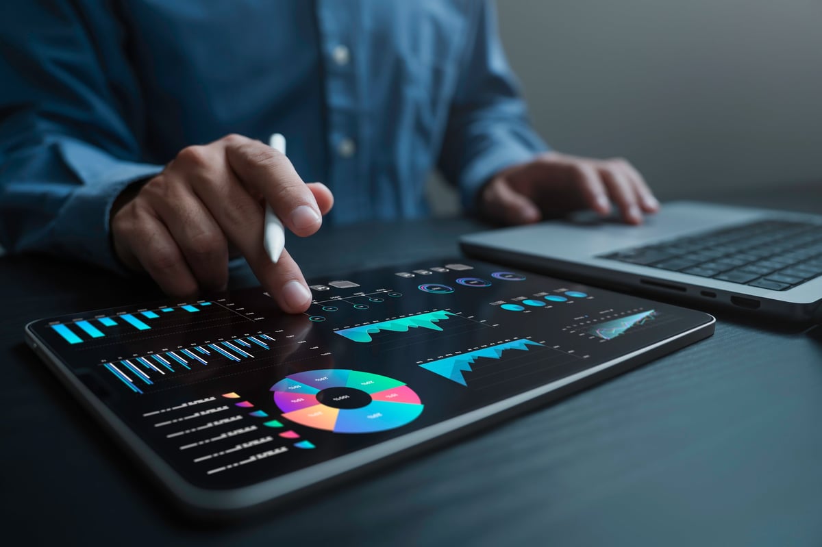 Data analyst uses computer and dashboard for data business analysis with KPI and metrics