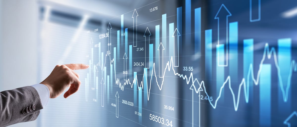 Financial growth graph on virtual screen showing sales increase and marketing strategy concept